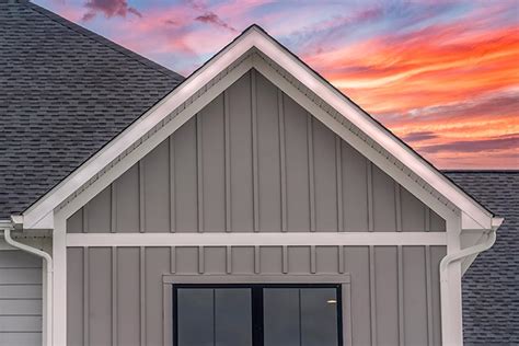 aqua board and baton house with metal roof|board and batten metal roof.